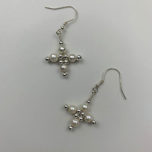 31. Cross pearl earrings