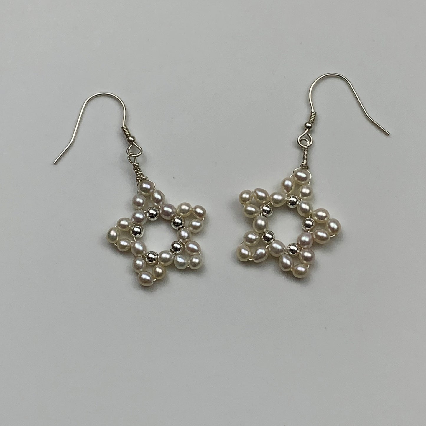 27. Star Pearl earrings