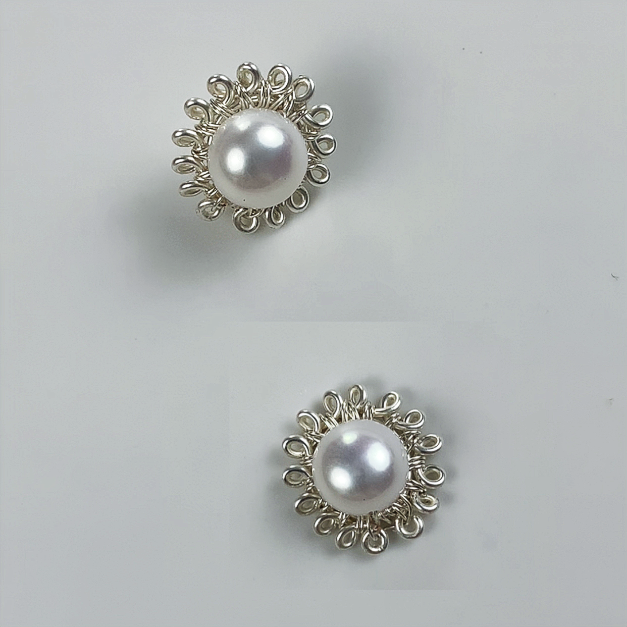 34.Small flower pearl stud earrings