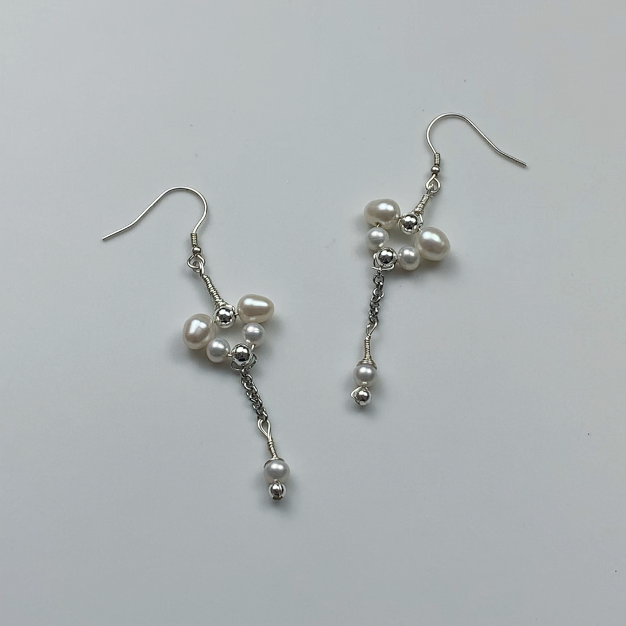 46.Butterfly pearl earrings