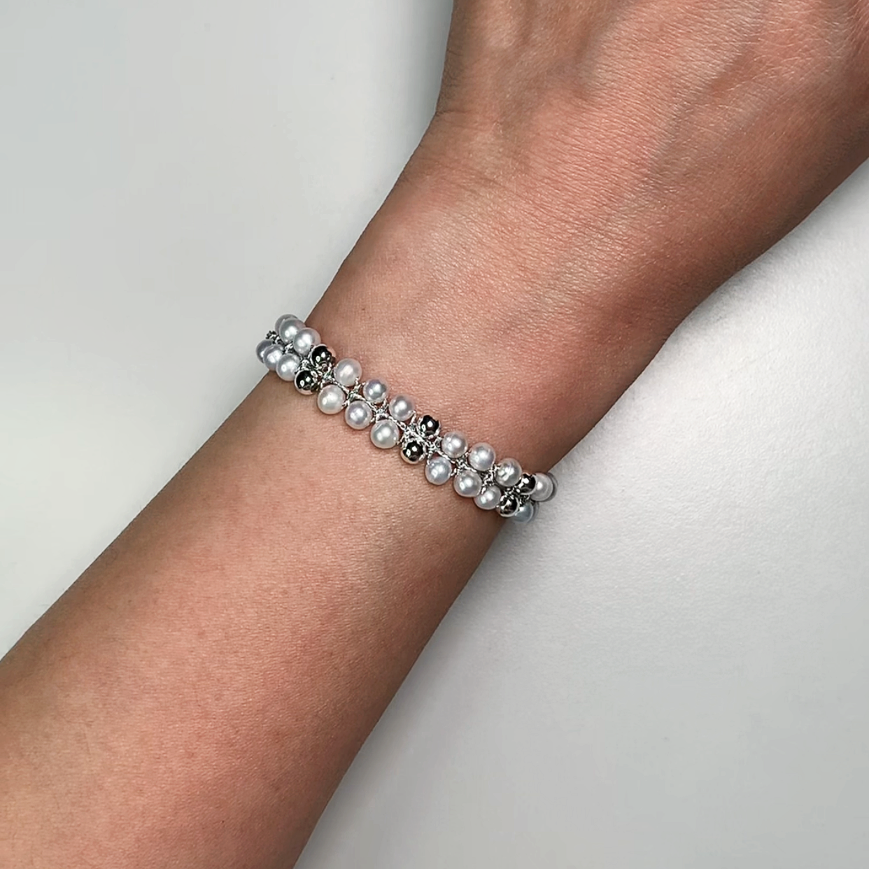 55.Hand-woven pearl bracelet