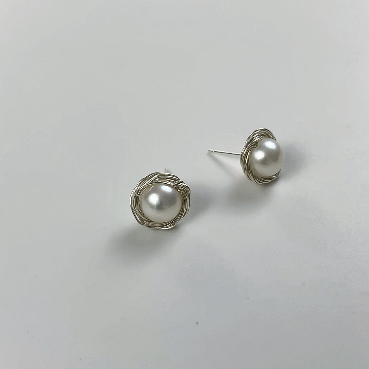 78.Pearl stud earrings