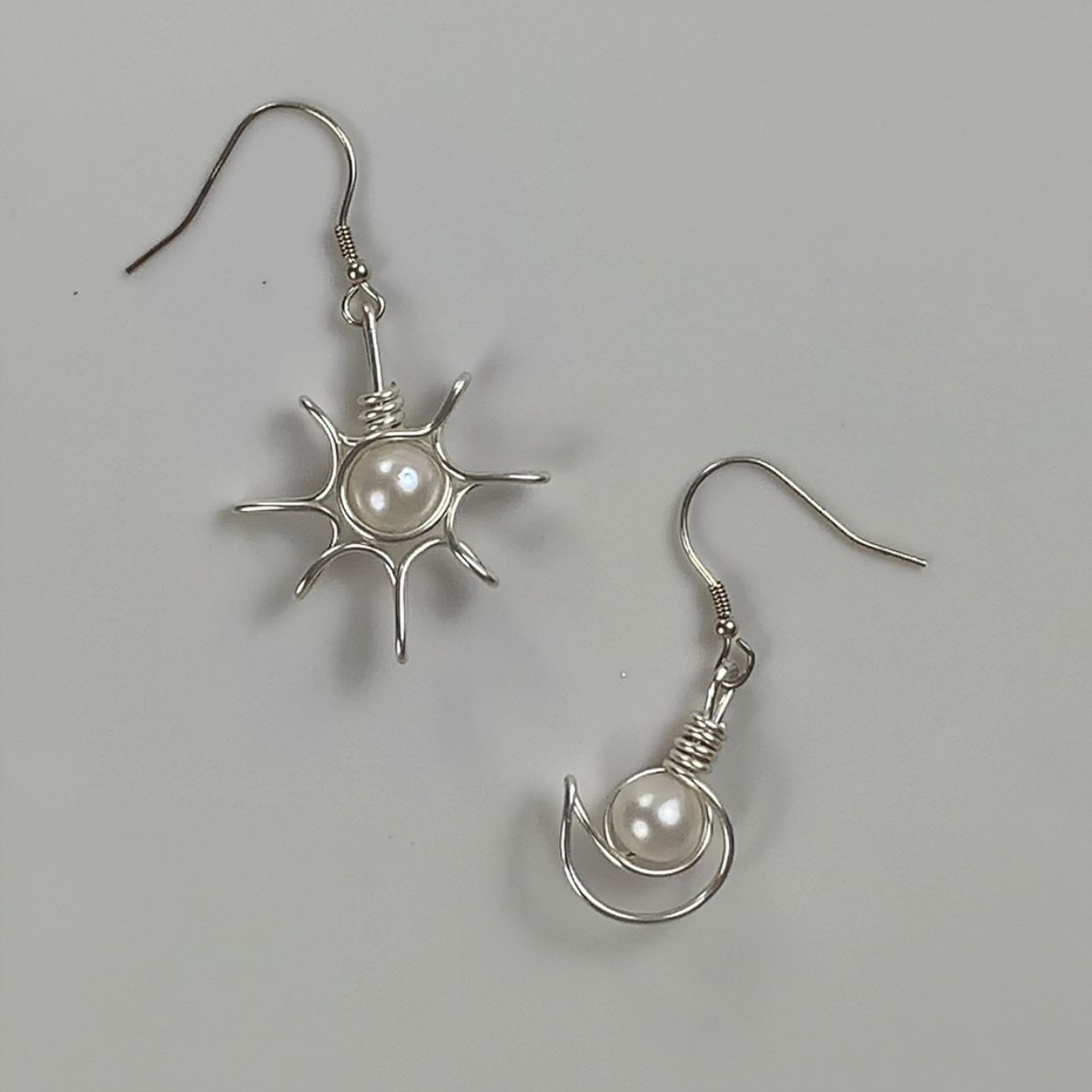 81.Sun-moon pearl earrings